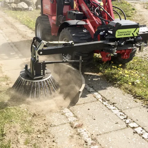 Grounds management of weeds on sidewalks