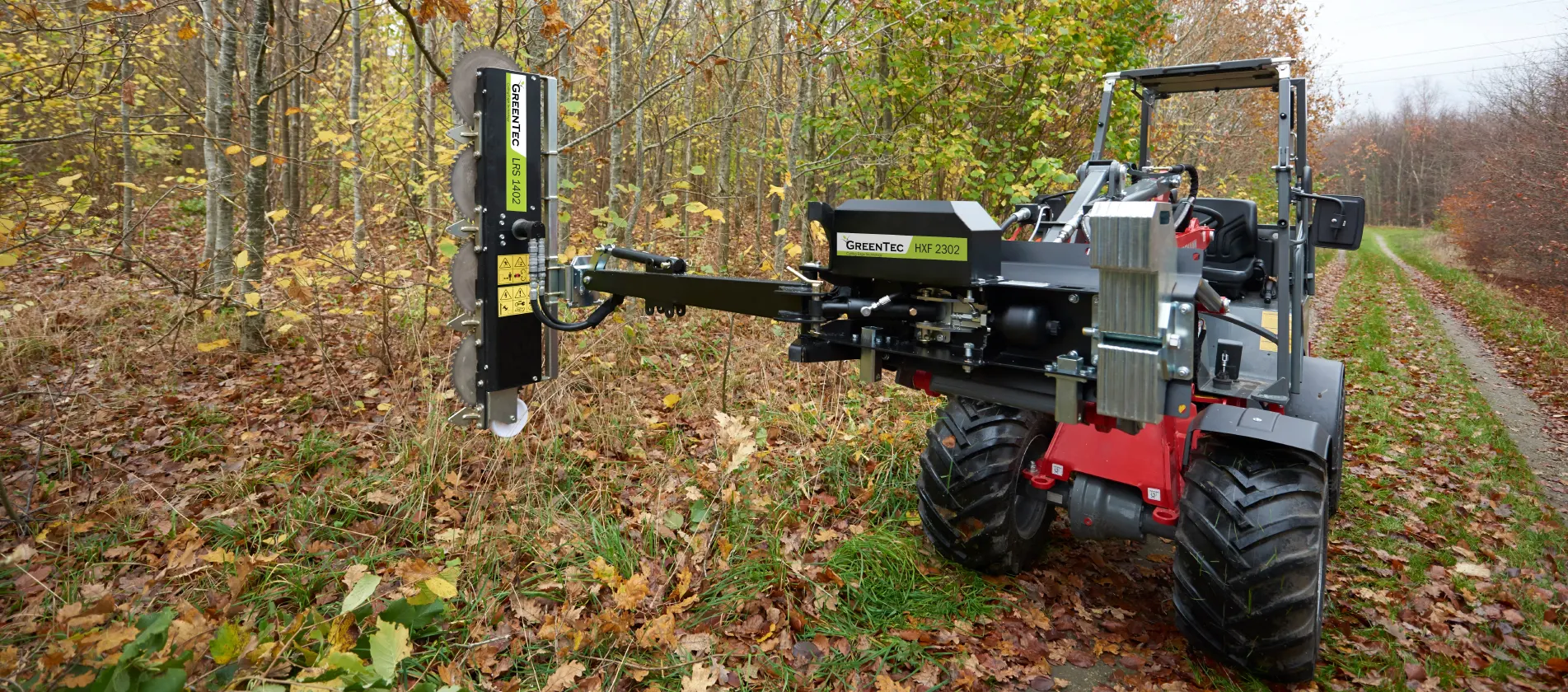 Skid steer mounted tree trimmer