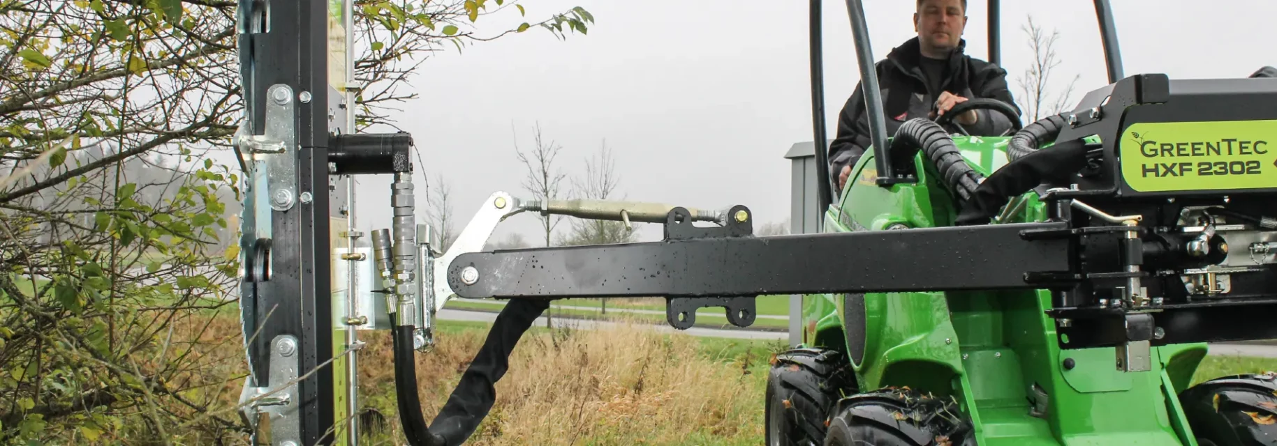 Tree trimmer attachment for skid steer loader