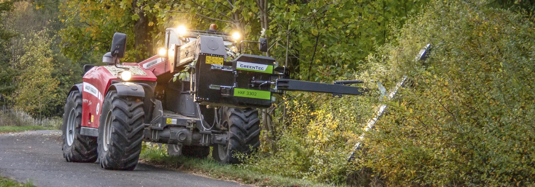 Telehandler attachment for hedge cutting