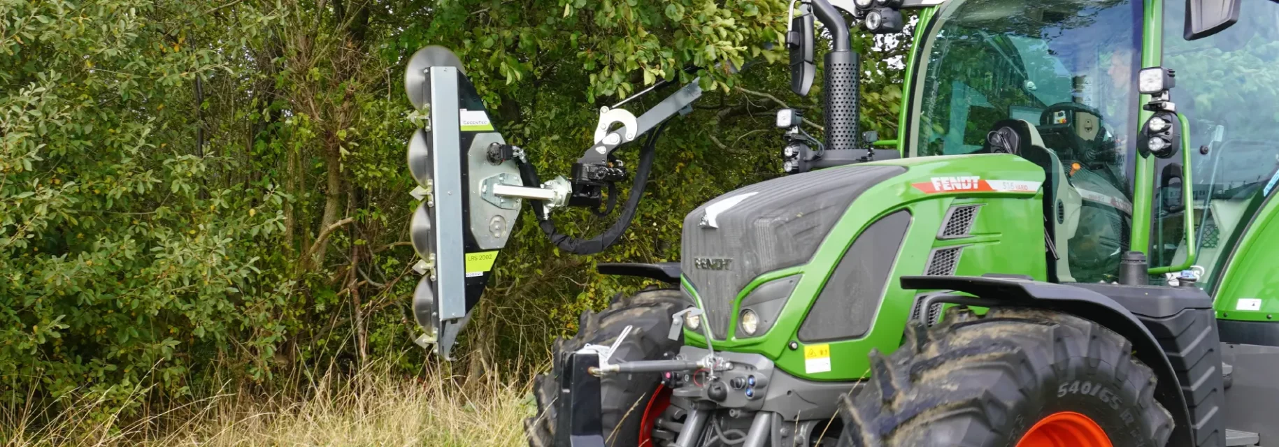 Circular saw hedge cutter mounted on tractor