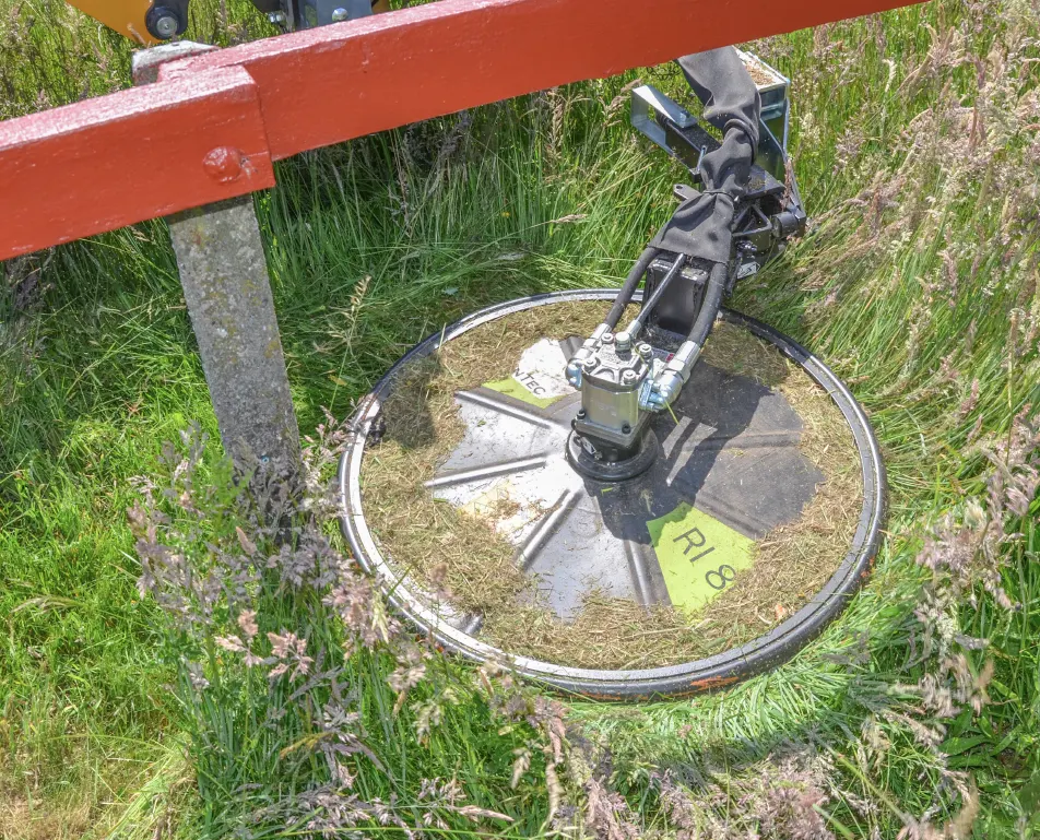 Mow close to fence posts and trees