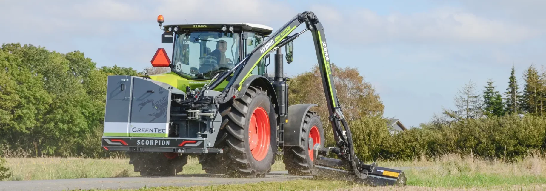 Verge mowing with boom mower arm