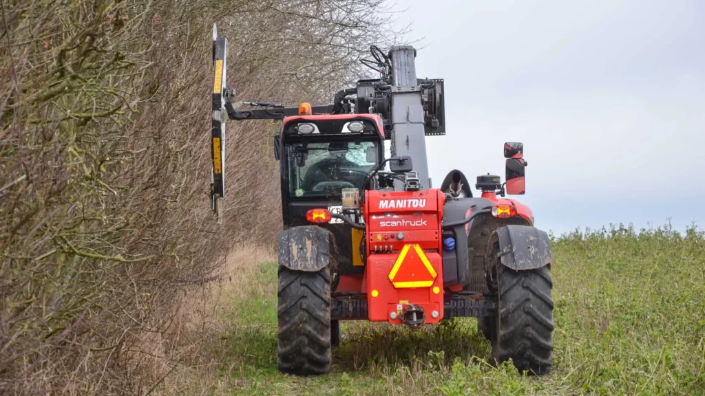 Farm hedge cutting with telehandler