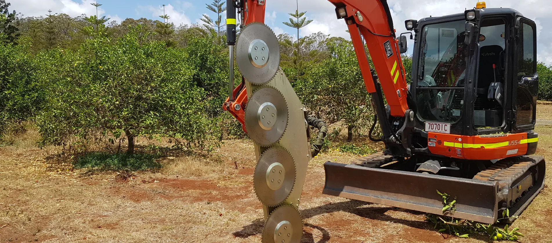 Orchard pruner mounted on excavator