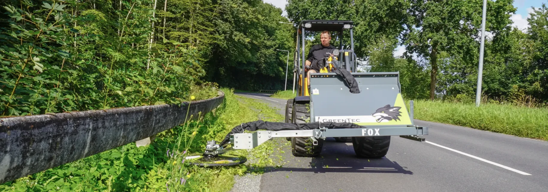 Guardrail mower for skid steer loader