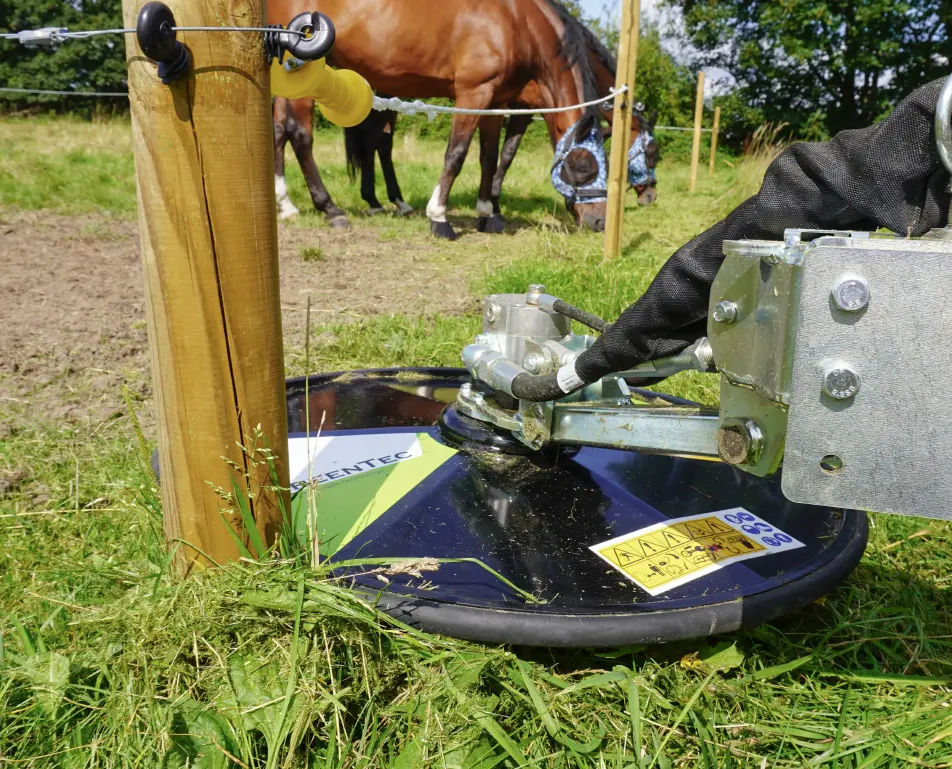 Mow close to fence posts and trees