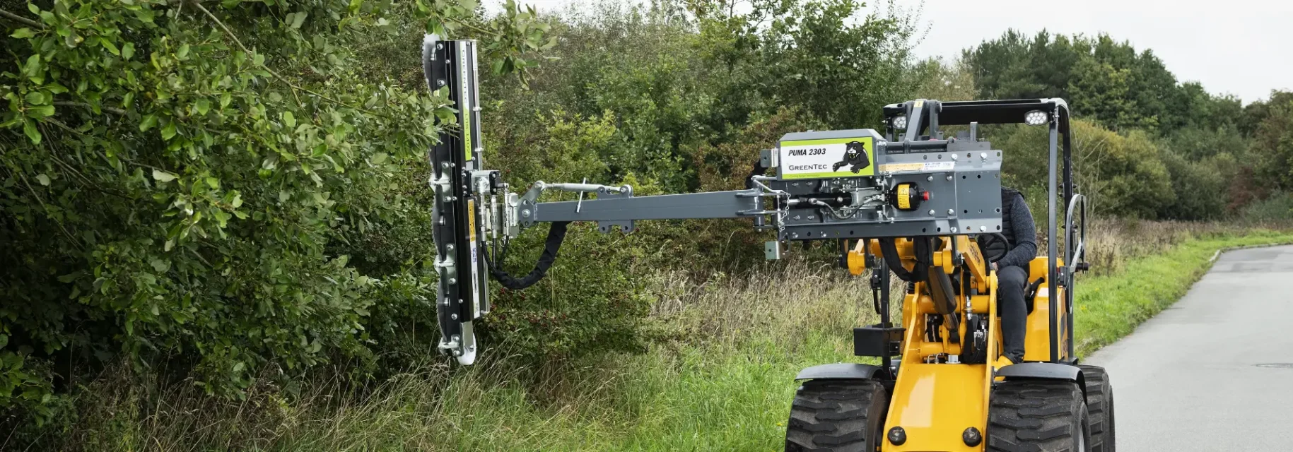 Limb saw mounted on skid steer loader