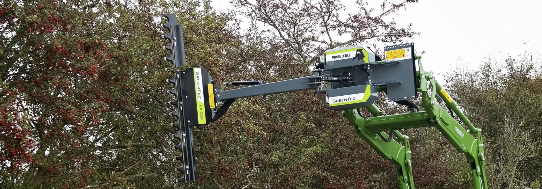 Tree trimmer mounted on front end loader