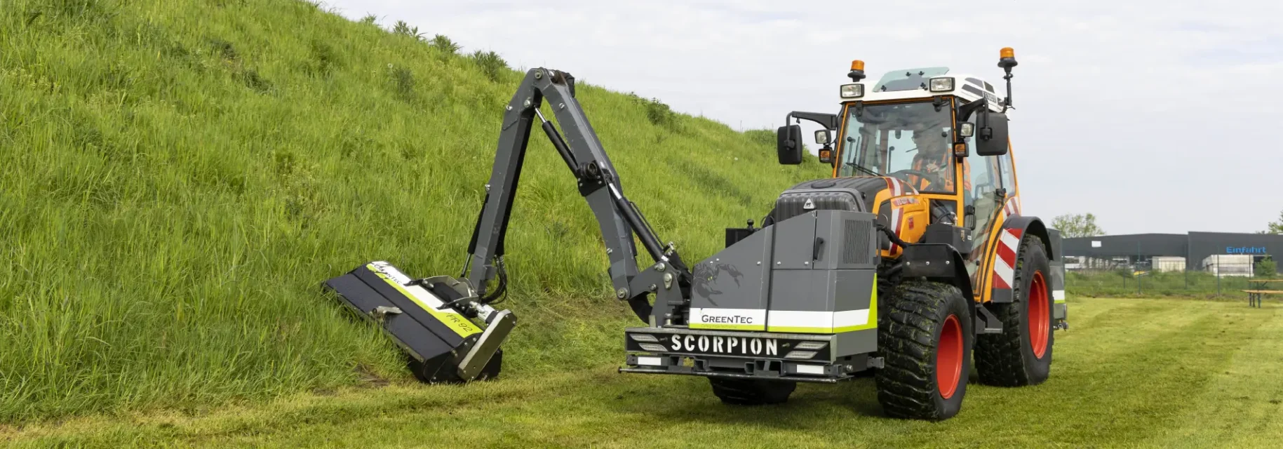 Verge mowing with small boom mower