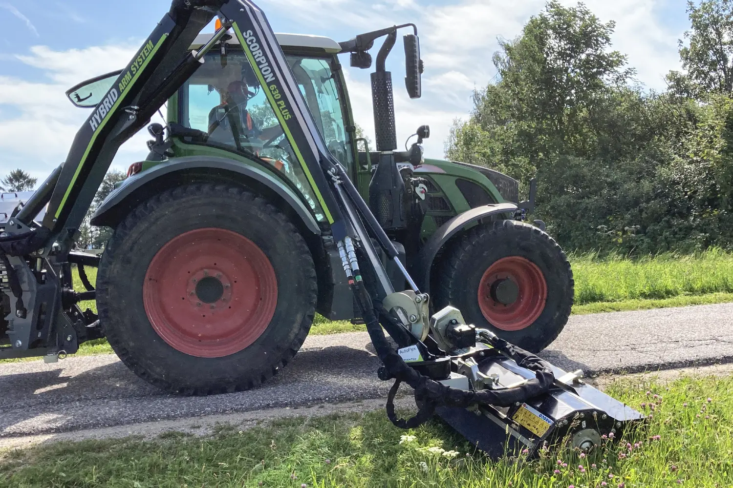 Verge mowing with flail mower attachment